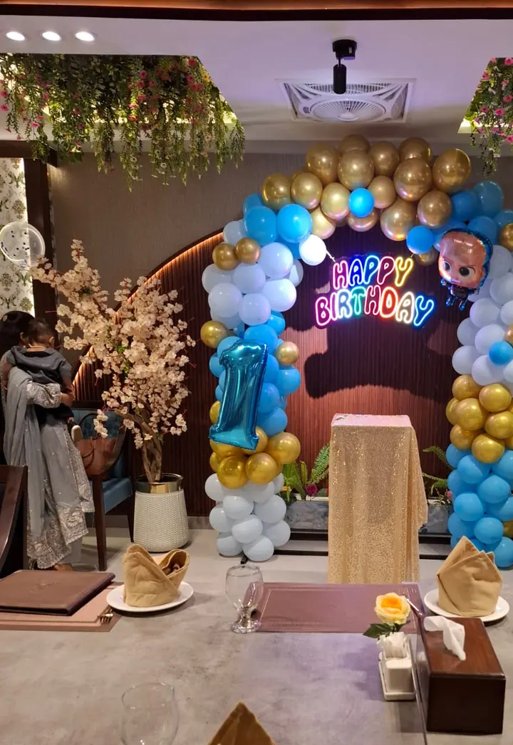 A birthday setup with balloons at Royal Sofra