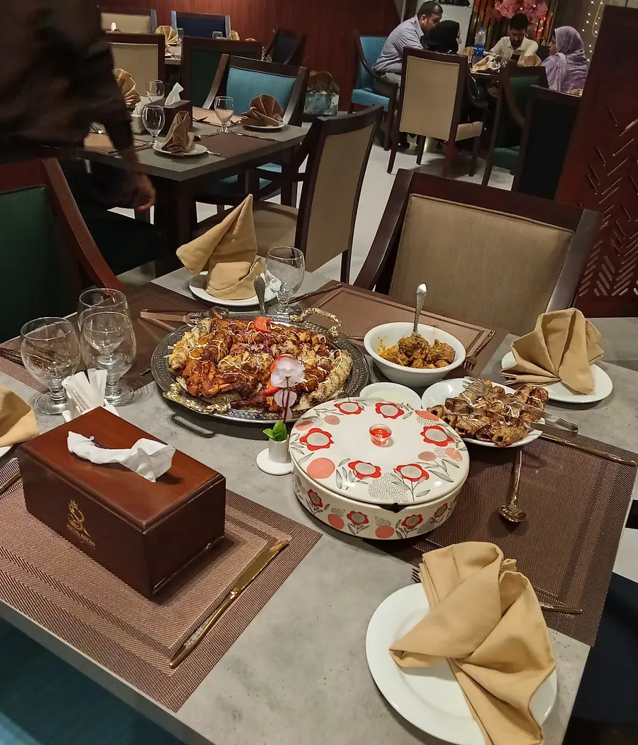 A table laid with dishes at Royal Sofra